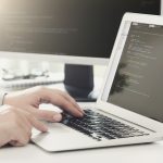 Programmer on Laptop